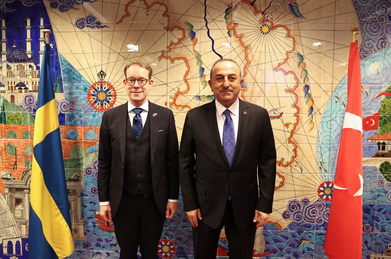 Foreign Minister Mevlüt Çavuşoğlu (R) and his Swedish counterpart Tobias Billström pose for a picture following talks on the sidelines of a NATO foreign ministers&#039; meeting in Brussels, Belgium, April 4, 2023. (AA Photo)