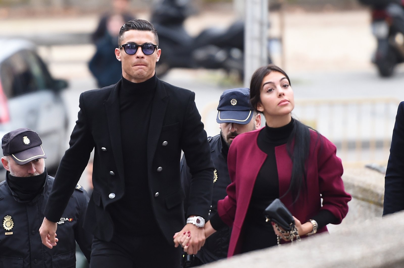 Cristiano Ronaldo (L) arrives with his girlfriend Georgina Rodriguez at the Audiencia Provincial de Madrid court, Madrid, Spain, Jan. 22, 2019. (Getty Images Photo)