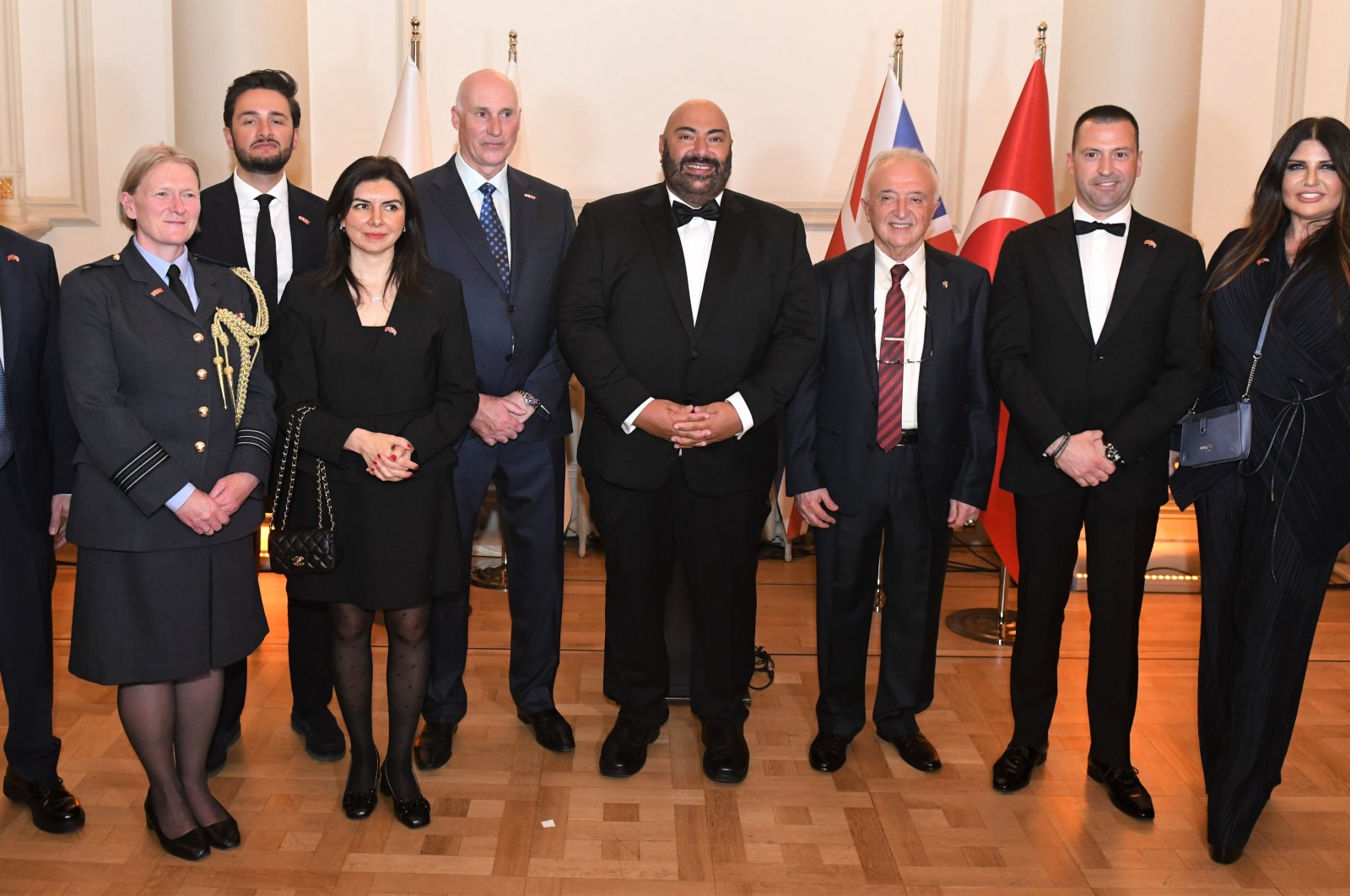 Executives of CANiK and AEI Systems and other officials pose for a photo during an event in Istanbul, Türkiye, April 26, 2023. (Courtesy of CANiK)