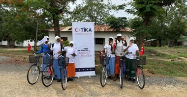 Tanzanian students are photographed riding bicycles donated by the Turkish Cooperation and Coordination Agency (TIKA), in Tanga province, Tanzania, April 28, 2023. (AA Photo)