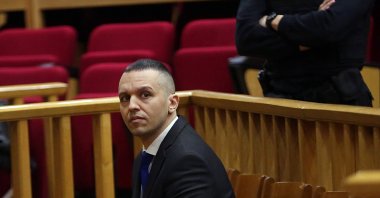 Former Greek deputy Ilias Kasidiaris (L), who was sentenced to 13 years in jail for being a member of and leading the neo-Nazi criminal organization Golden Dawn, at the Athens Appeals Court, Greece, Dec. 14, 2022. (EPA Photo)