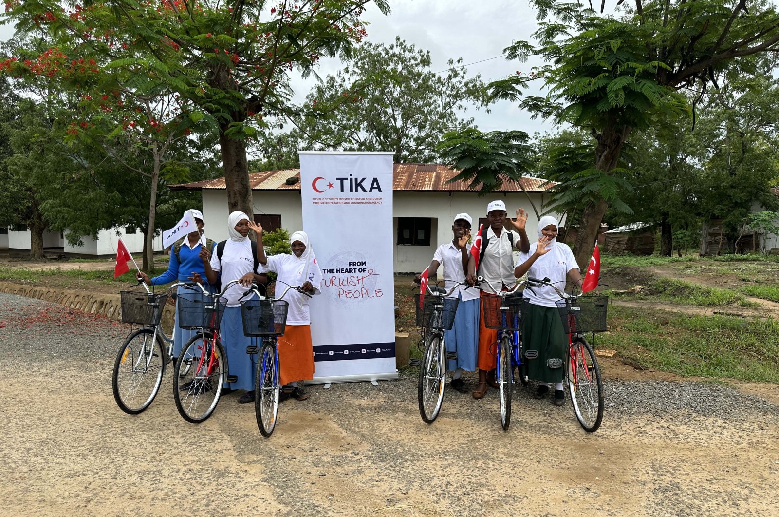 Tanzanian students are photographed riding bicycles donated by the Turkish Cooperation and Coordination Agency (TIKA), in Tanga province, Tanzania, April 28, 2023. (AA Photo)