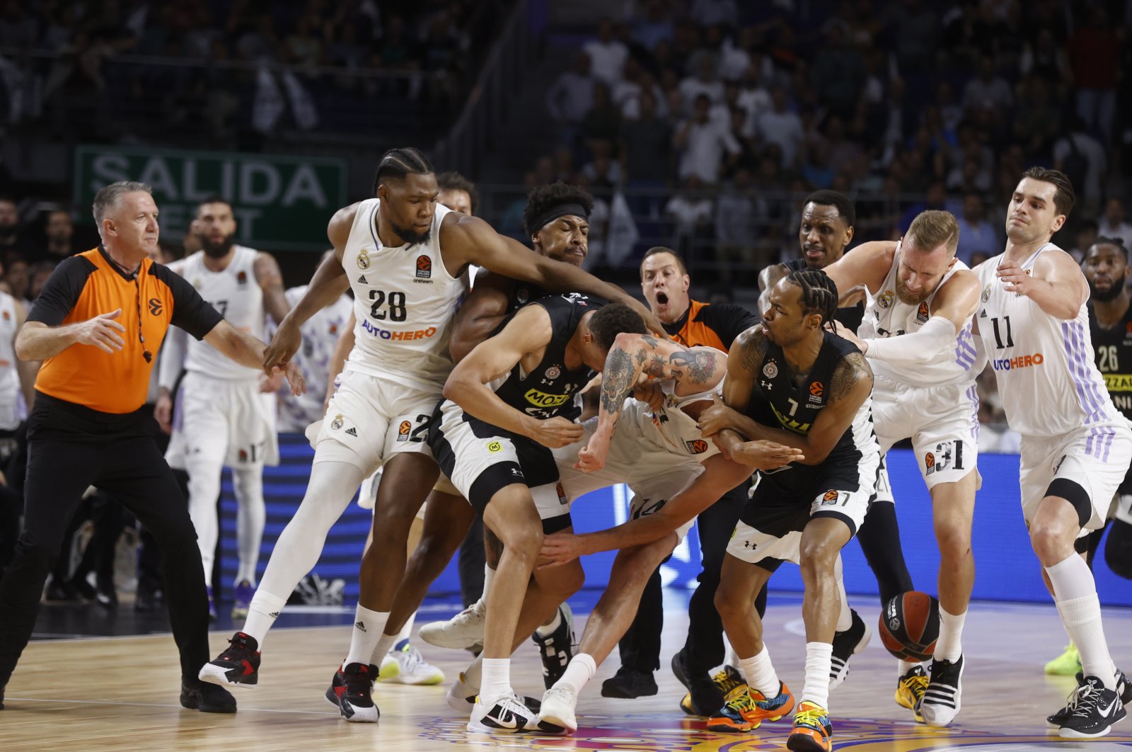 Players scuffle during the Euroleague basketball match between Real Madrid and Partizan Belgrade at Wizink Center, Madrid, Spain, April 27, 2023. (EPA Photo)