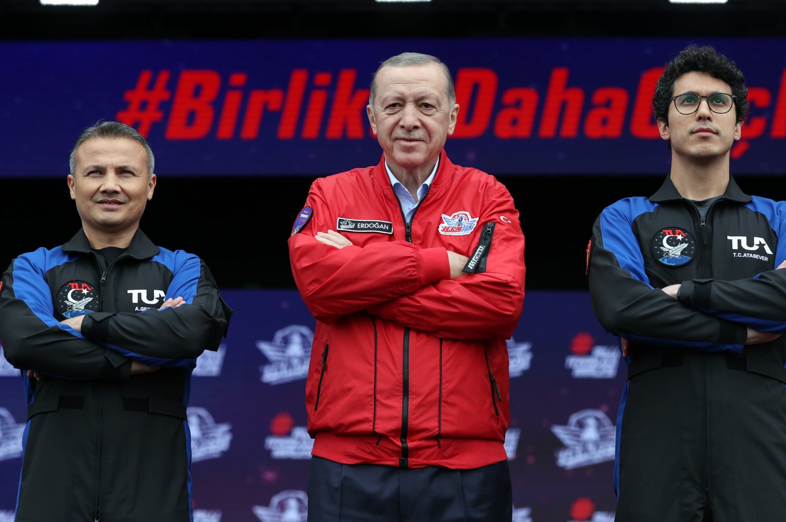 President Recep Tayyip Erdoğan (C) alongside Alper Gezeravcı (L) and Tuna Cihangir Atasever at Teknofest, in Istanbul, Türkiye, April 29, 2023. (AA Photo)