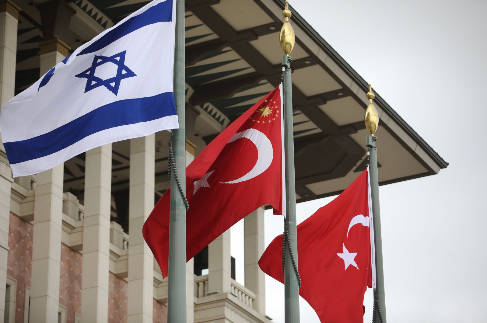 The Turkish and Israeli flags wave during a ceremony where Israeli President Isaac Herzog was welcomed with an official ceremony by President Recep Tayyip Erdoğan in capital Ankara, Türkiye, March 9, 2022. (Getty Images Photo)