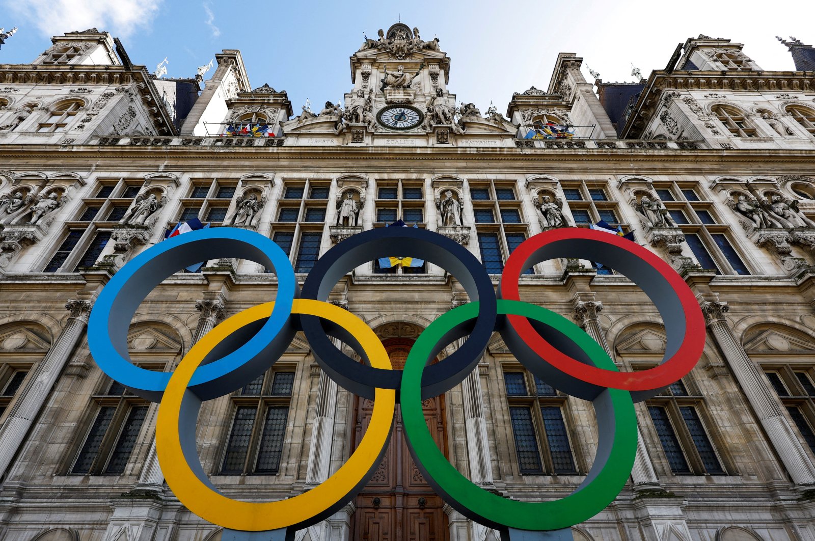 The Olympic rings are seen in front of the Hotel de Ville City Hall, Paris, France, March 14, 2023. (Reuters Photo)