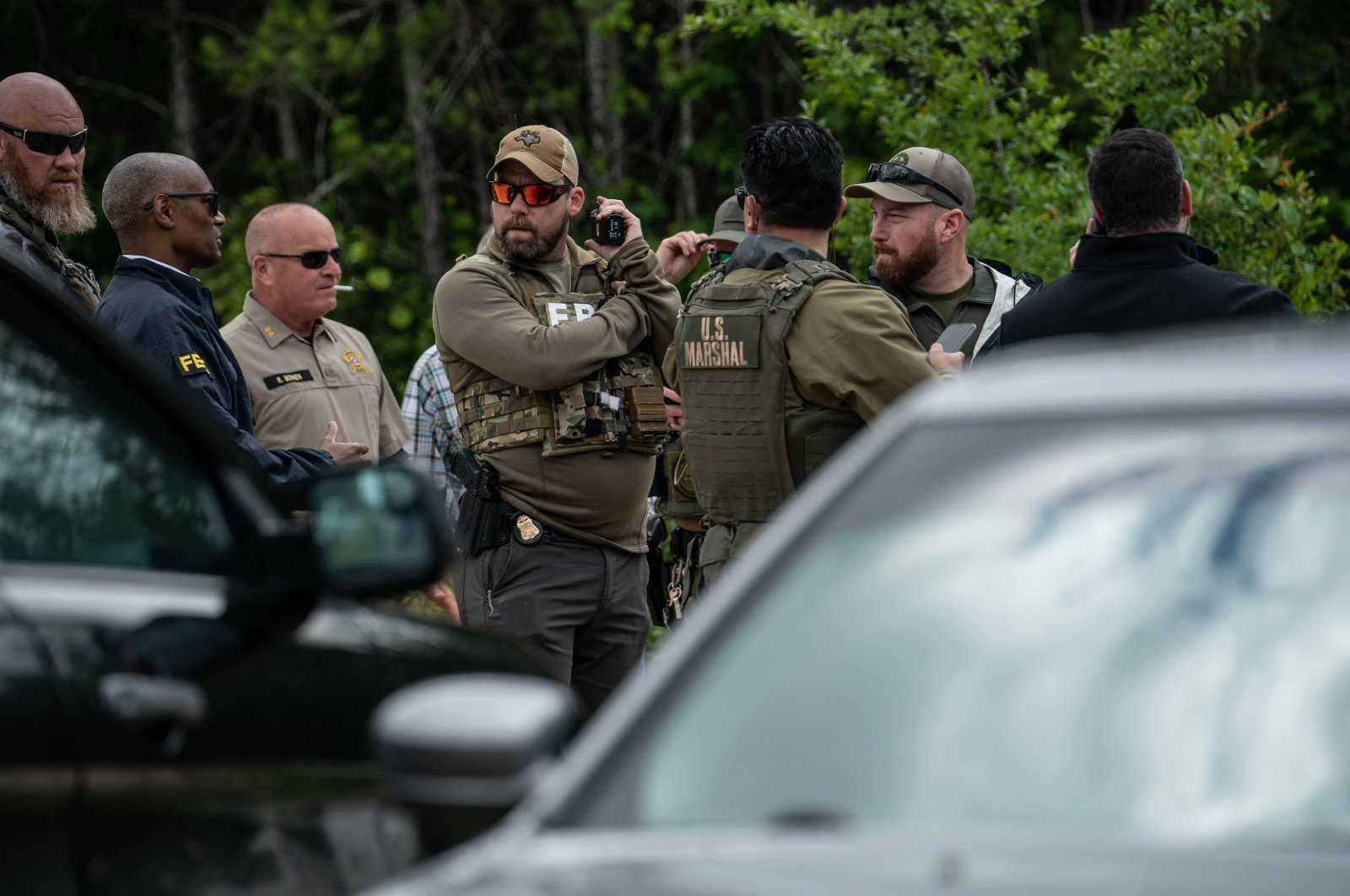 Law enforcement search for the suspect a few miles from the scene where five people in Cleveland, Texas, U.S., April 29, 2023. (AFP Photo)