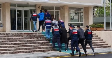 Police escort Daesh-linked terrorism suspects in Mersin province, Türkiye, April 11, 2023. (AA File Photo)