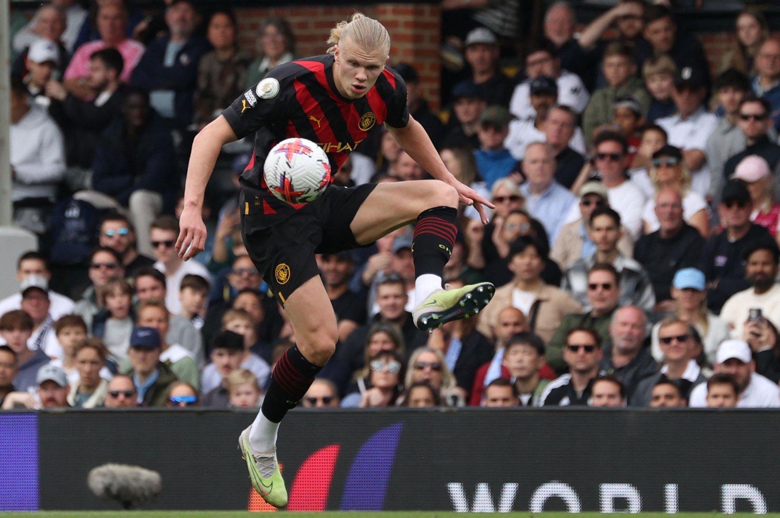 Manchester City&#039;s Erling Haaland controls the ball during the English Premier League football match against Fulham at Craven Cottage, London, UK., April 30, 2023. (AFP Photo)