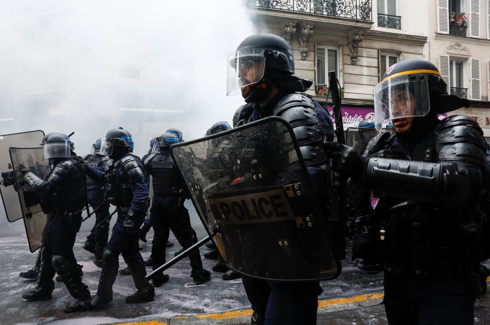 Riot police officers stand guard during the traditional May Day labor march, Paris, France May 1, 2023. (Reuters Photo)