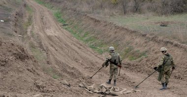 Azerbaijan military sappers clear Armenian mines in the countryside outside the town of Fuzuli, Azerbaijan, Nov. 26, 2020. (AFP Photo)