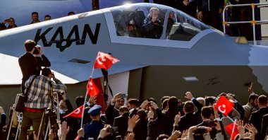 President Recep Tayyip Erdoğan sits inside Türkiye’s domestically developed 5th-generation fighter jet, named "KAAN," as he attends the "Century of the Future" event at the Turkish Aerospace Industries (TAI) headquarters in the Kahramankazan district of Ankara, Türkiye, May 1, 2023. (AA Photo)