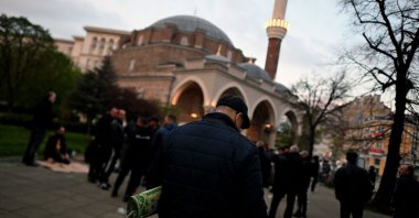 A Bulgarian man of Turkish descent takes part in Ramadan Bayram prayers outside Banya Bashi Mosque in downtown Sofia, Bulgaria, April 21, 2023. (EPA Photo)