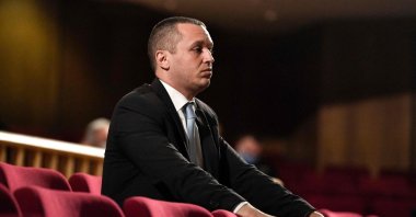 Ilias Kasidiaris, former Golden Dawn MP and spokesperson, who was handed a sentence of 13 years imprisonment, stands in the appeals court in Athens on Oct. 21, 2020. (AFP File Photo)