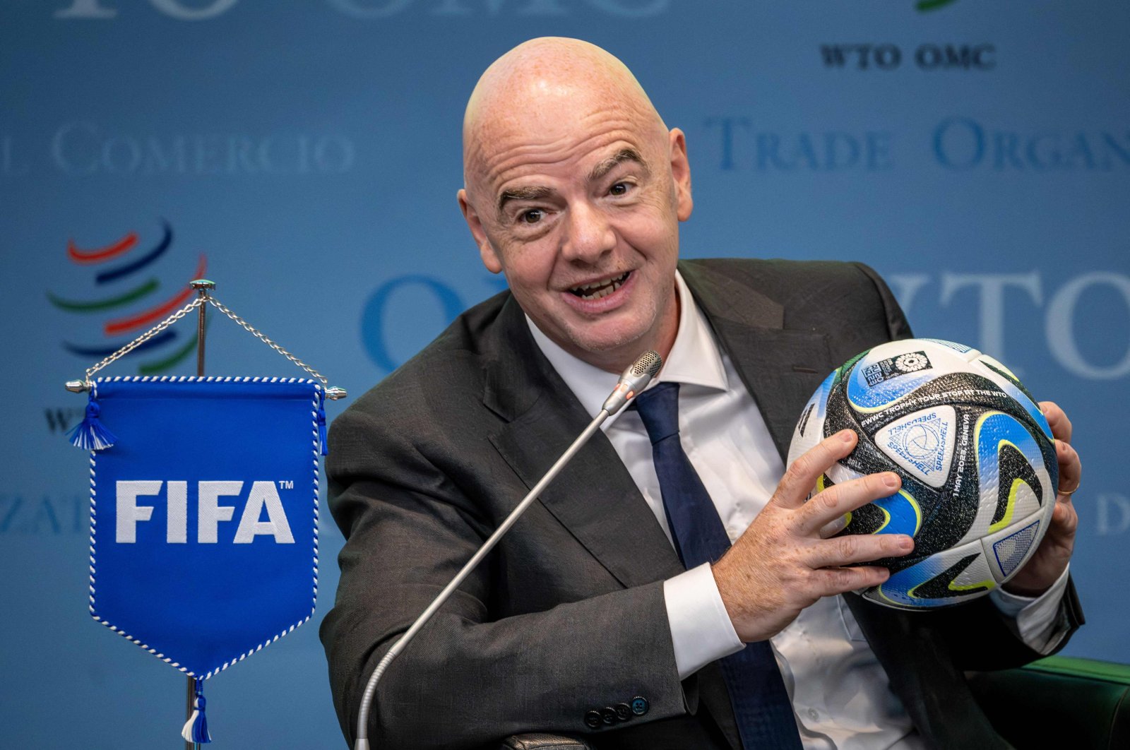 FIFA President Gianni Infantino holds an official ball of the 2023 FIFA Women&#039;s World Cup during the &quot;Making trade score for women!&quot; discussion on the use of football as a tool for trade and development at the WTO headquarters, Geneva, Switzerland, May 1, 2023. (AFP Photo)