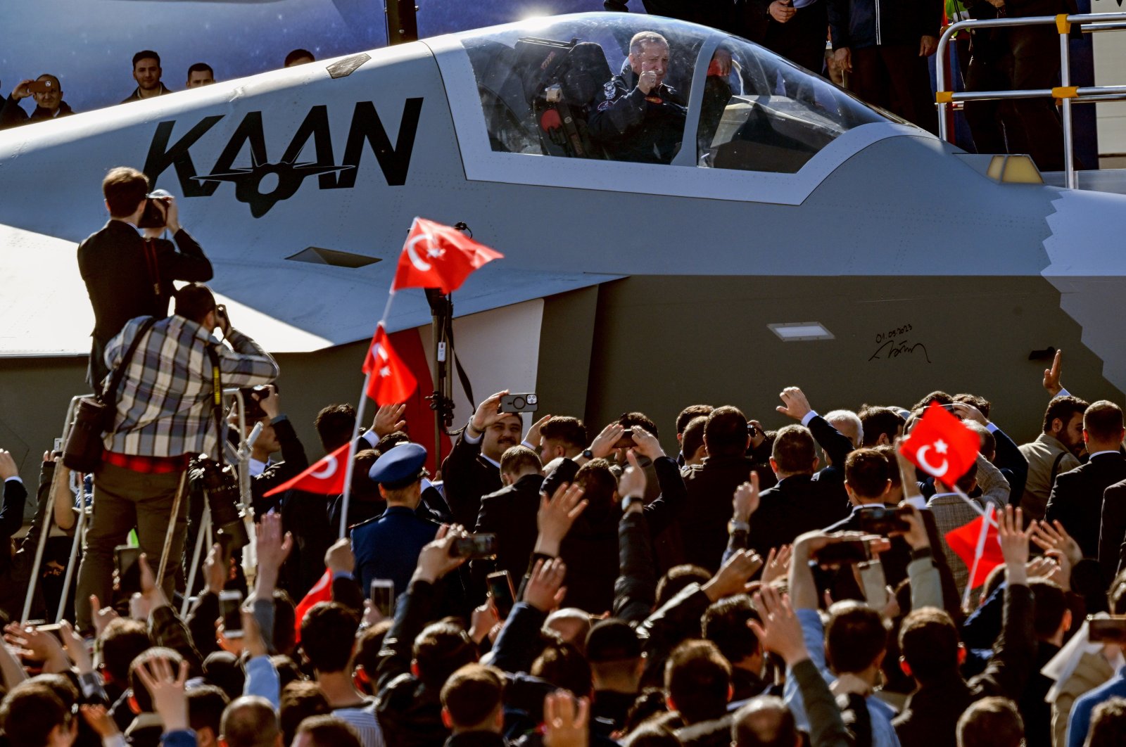 President Recep Tayyip Erdoğan sits inside Türkiye’s domestically developed 5th-generation fighter jet, named "KAAN," as he attends the "Century of the Future" event at the Turkish Aerospace Industries (TAI) headquarters in the Kahramankazan district of Ankara, Türkiye, May 1, 2023. (AA Photo)