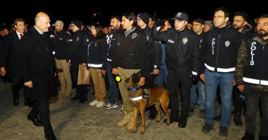 Interior Minister Süleyman Soylu is seen along with his team and a police drug-sniffer dog after a successful anti-narcotics operation in Erzurum, Türkiye, May 3, 2023. (DHA Photo)