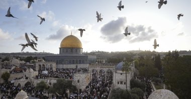 Palestinians attend Eid al-Fitr holiday celebrations by the Dome of the Rock shrine in the Al-Aqsa Mosque compound in Jerusalem's Old City, April 21, 2023. (AP Photo)