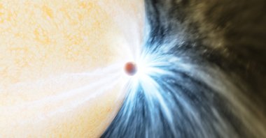 This undated artist's impression shows a doomed planet skimming the surface of its star, located about 15,000 light-years away from Earth, before being fully engulfed. (K. Miller/R. Hurt Caltech/IPAC/Handout via Reuters)