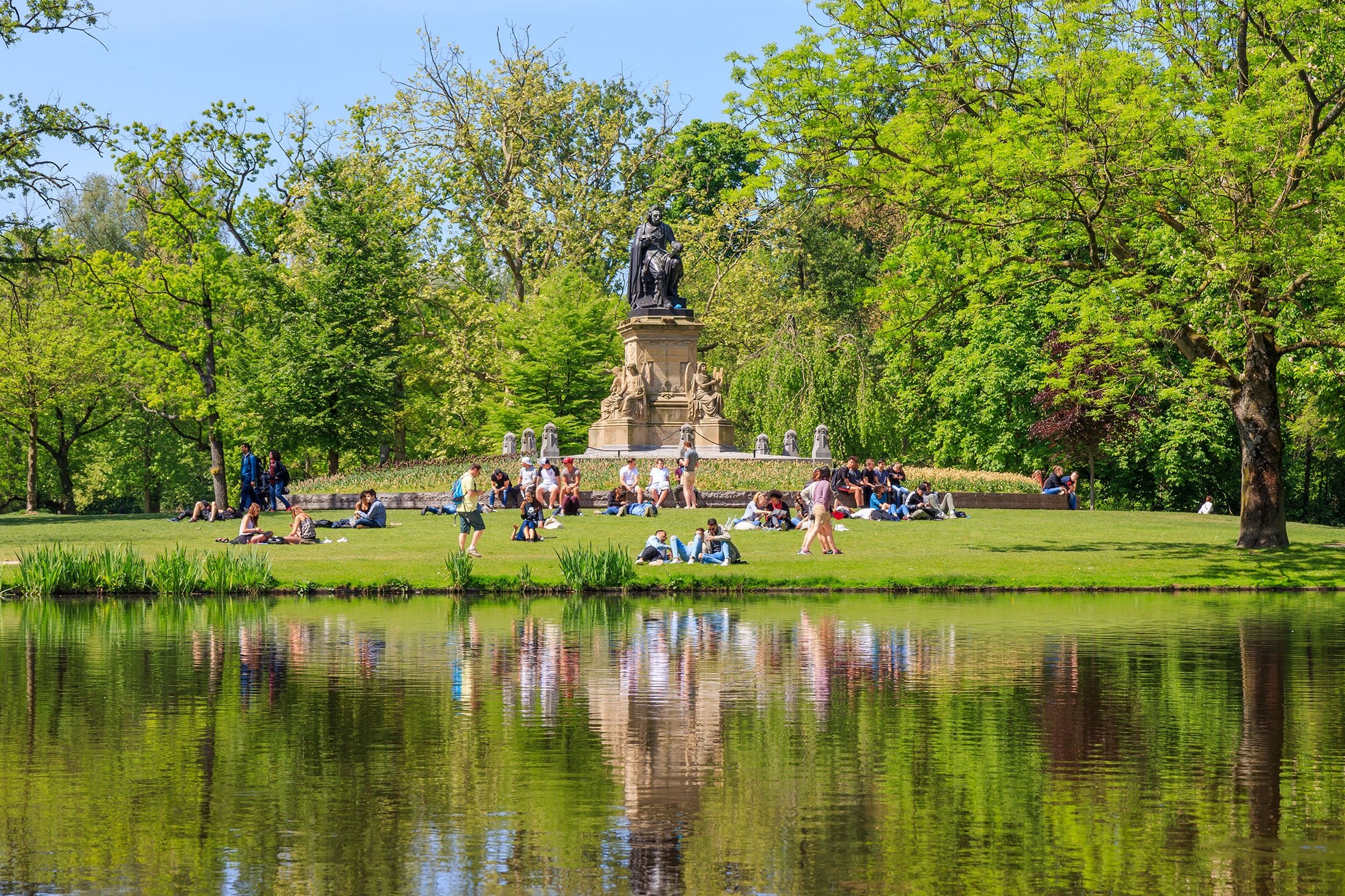 People relax in Vondelpark, in Amsterdam, Netherlands. (Shutterstock Photo)