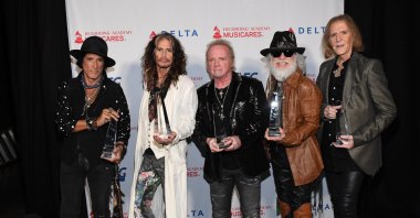 (L-R) Joe Perry, Steven Tyler, Joey Kramer, Brad Whitford and Tom Hamilton of music group Aerosmith, recipients of the Person of the Year award, attend MusiCares Person of the Year honoring them at Los Angeles Convention Center, California, U.S., Jan. 24, 2020. (Getty Images Photo)