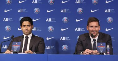 Lionel Messi (R) speaks with journalists with PSG President Nasser Al-Khelaifi during a conference of Paris Saint-Germain at Parc des Princes, Paris, France, Aug. 11, 2021. (Getty Images Photo)