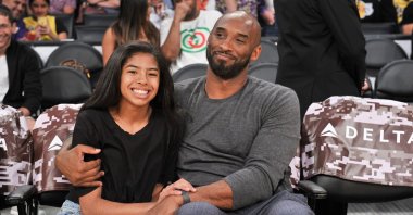 Kobe Bryant (R) and his daughter Gianna Bryant (L) attend a basketball game between the Los Angeles Lakers and the Atlanta Hawks at Staples Center, Los Angeles, U.S., Nov. 17, 2019. (Getty Images Photo)
