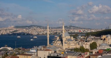 A general view of Istanbul's New Mosque and passing ships. (Shutterstock Photo)