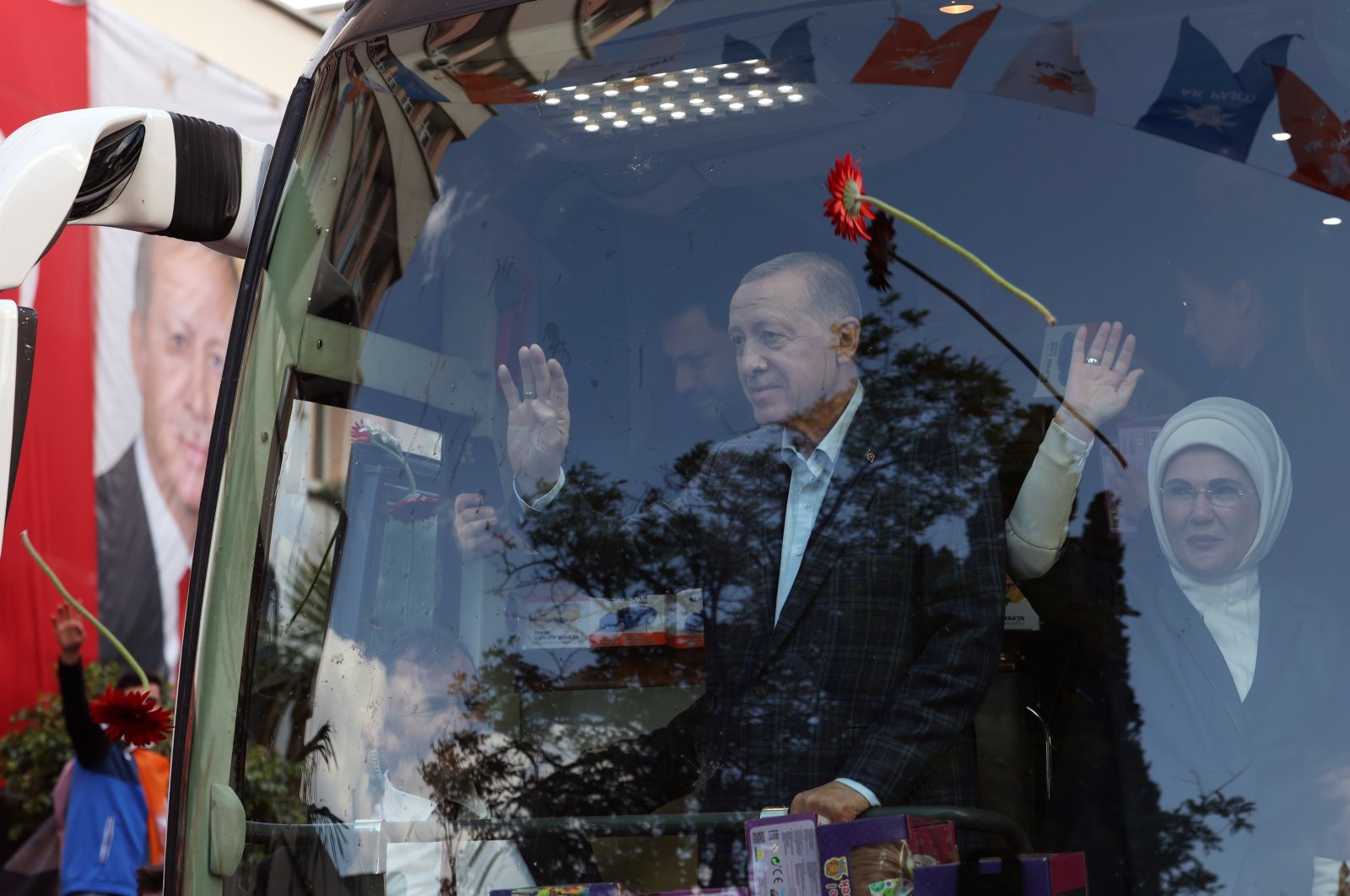 President Recep Tayyip Erdoğan and his wife Emine Erdoğan greet supporters during a rally in Izmir, April 29, 2023. (AA File Photo)