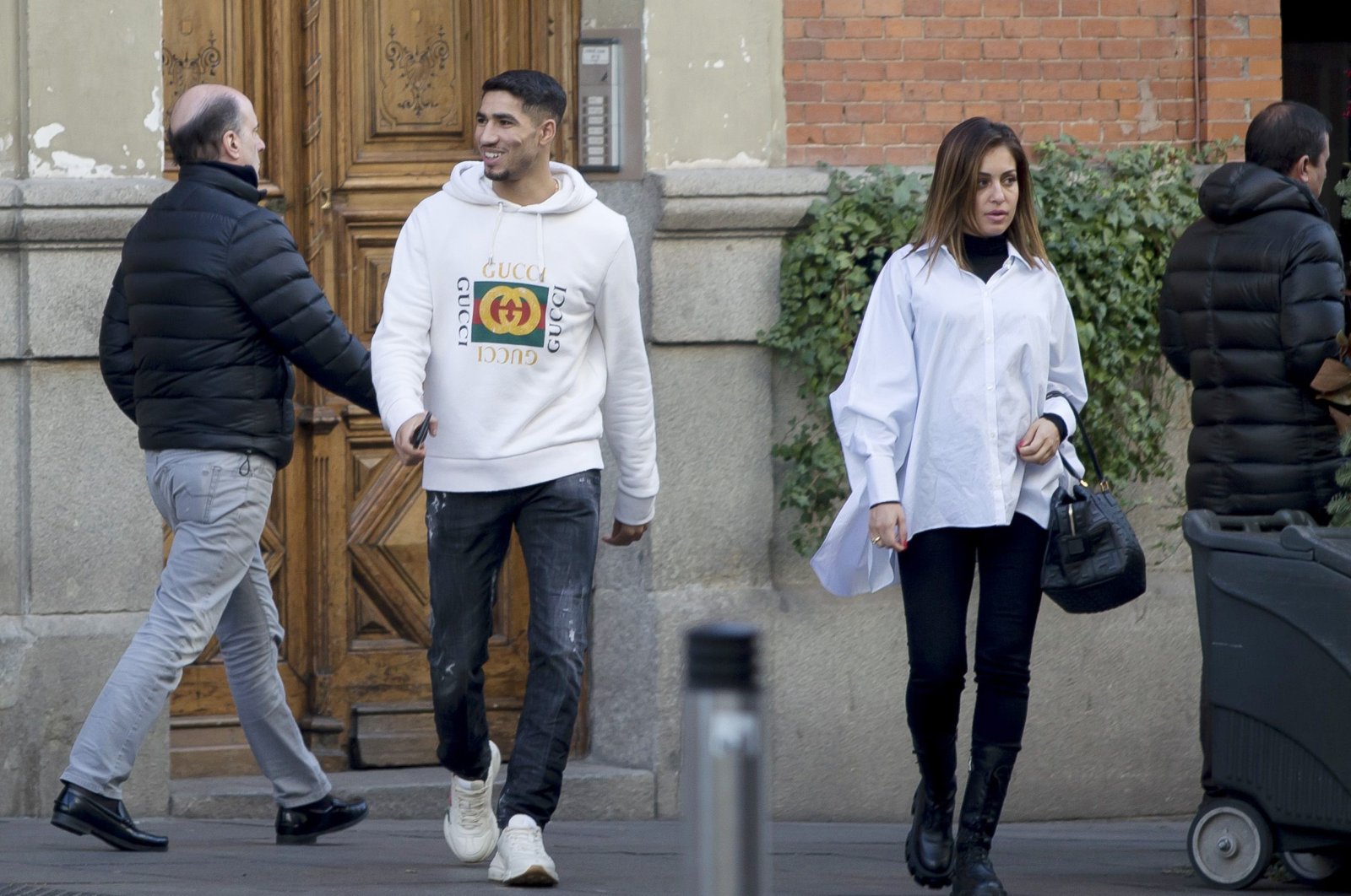 Hiba Abouk and Achraf Hakimi are seen walking in public, Madrid, Spain, Jan. 03, 2020. (Getty Images Photo)