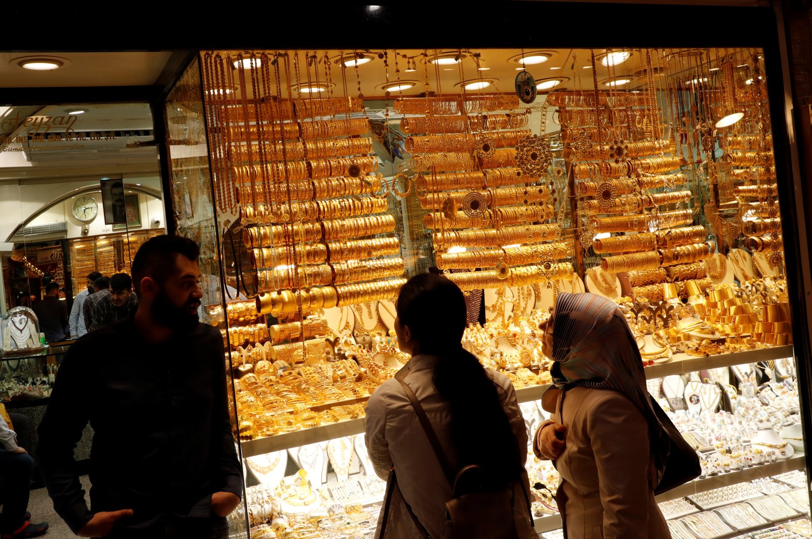 Women look at gold pieces at a jewelry shop in Istanbul, Türkiye, May 9, 2019. (Reuters photo)