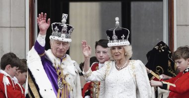 Britain's King Charles III and Queen Camilla wave on the balcony of Buckingham Palace, in London, following the coronation, Saturday, May 6, 2023. (AP Photo)