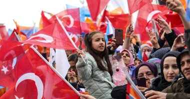 Supporters of President Recep Tayyip Erdoğan wave Turkish flags and cheer during his election campaign rally in Ankara, Türkiye, April 30, 2023. (AFP Photo)