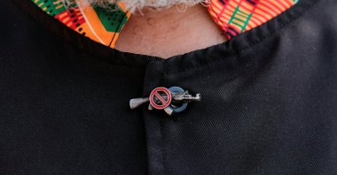 A button of a person is pictured at a rally against gun violence weeks after the mass shooting at The Covenant School, in Nashville, Tennessee, U.S., April 17, 2023. REUTERS/Kevin Wurm