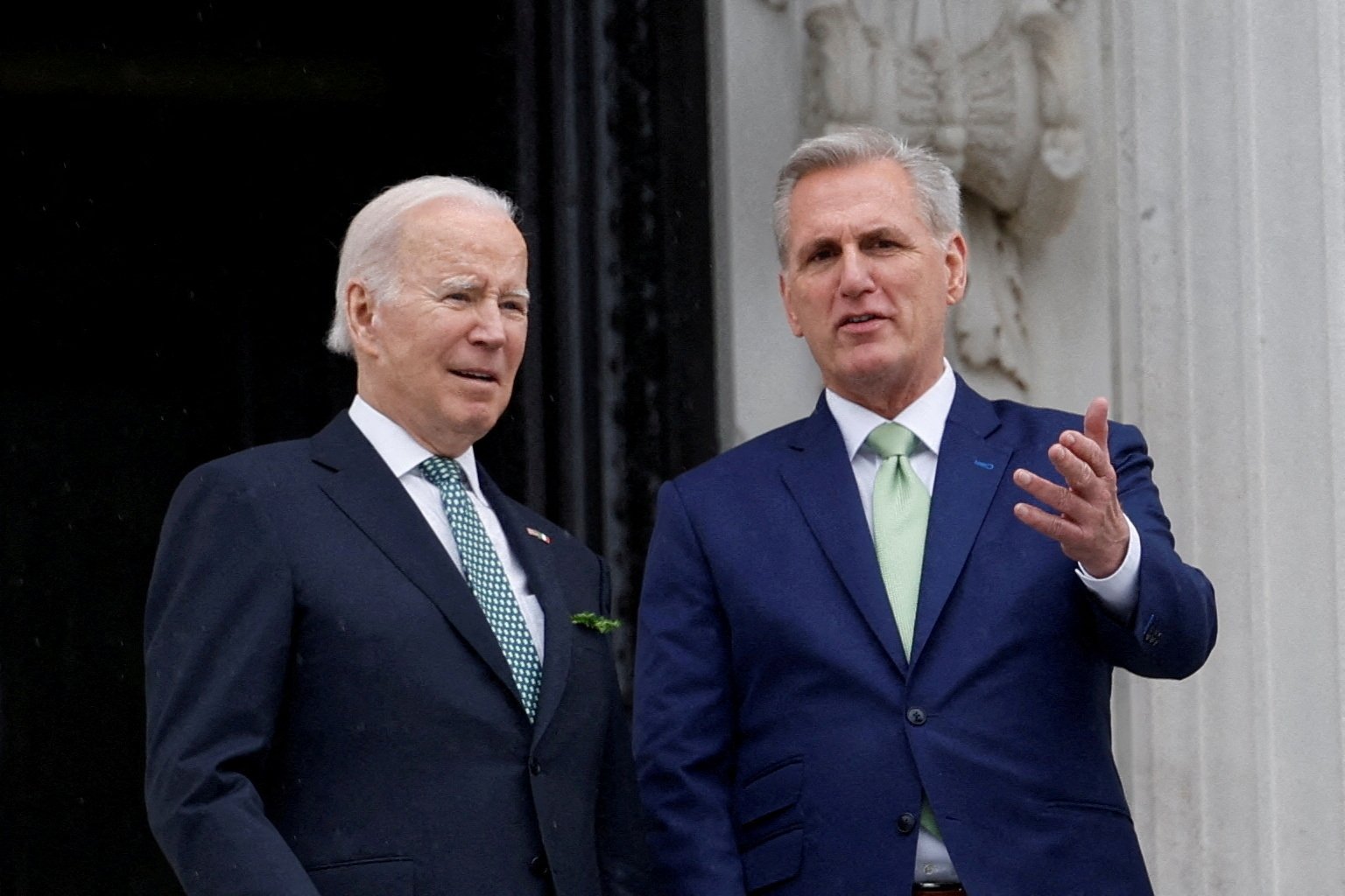 U.S. President Joe Biden talks with House Speaker Kevin McCarthy as they depart following the annual Friends of Ireland luncheon at the U.S. Capitol in Washington, U.S., March 17, 2023. (Reuters Photo)