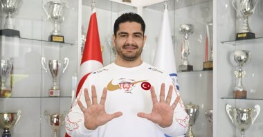 Turkish wrestler Taha Akgül poses for a photo after an interview, Ankara, Türkiye, May 3, 2023. (AA Photo)
