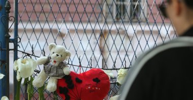 People leave flowers and tributes for the shooting victims in Belgrade, Serbia, May 5, 2023. (EPA Photo)