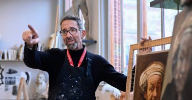 Peter Pelkmans, a lecturer at the Rijksmuseum&#039;s drawing school, gestures as answers a journalist&#039;s question in Amsterdam, the Netherlands, April 6, 2023. (AFP Photo)