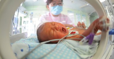 Medical staff take care of newborns at the East Hospital in Lianyungang, Jiangsu Province, China, April 29, 2023. (Getty Images Photo)