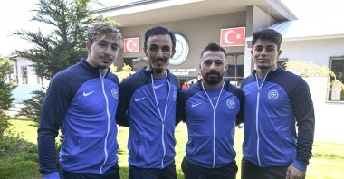 (L-R) Turkish weightlifters Yusuf Fehmi Genç, Muammer Şahin, Ferdi Mustal and Kaan Kahriman pose for a photo, Ankara, Türkiye, May 3, 2023. (AA Photo)