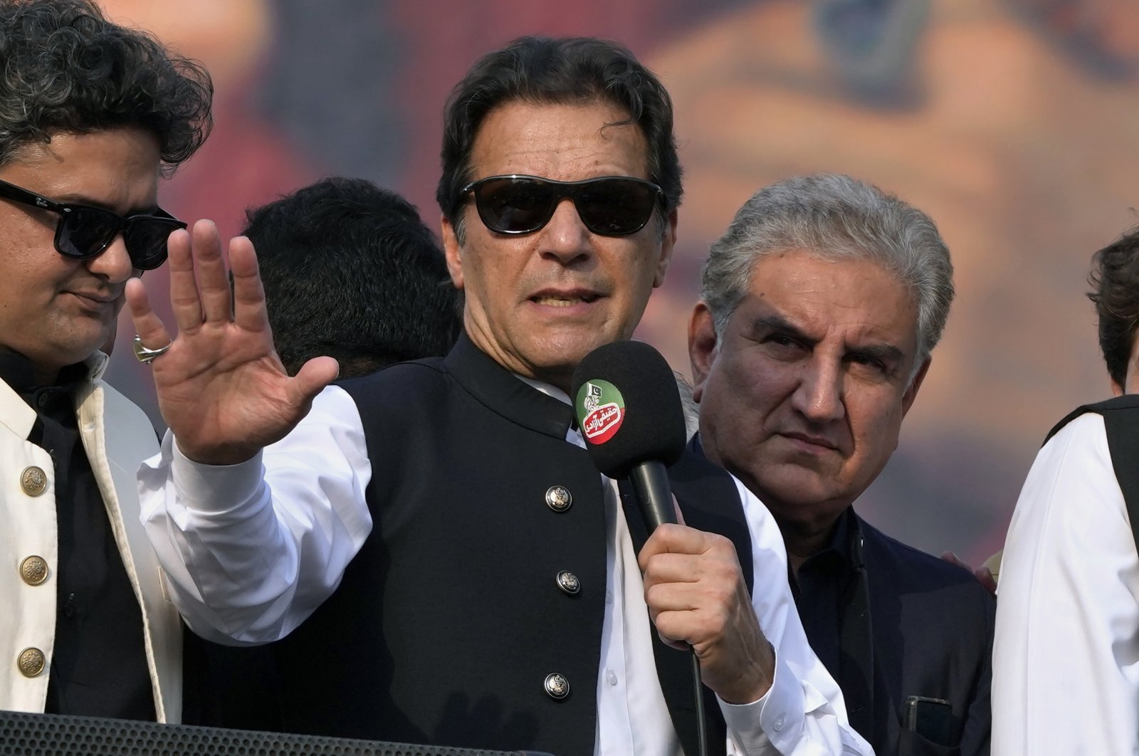 Pakistan&#039;s former PM Imran Khan (C) addresses his supporters at a rally in Lahore, Pakistan, Oct. 28, 2022. (AP Photos)