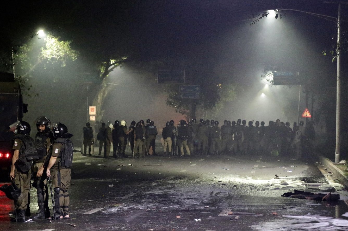 Security personnel gather during clashes with supporters of former Prime Minister Imran Khan near Khan&#039;s residence, in Lahore, Punjab province, Pakistan, May 10, 2023. (EPA Photo)