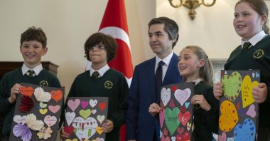 British students are photographed along with the Turkish Ambassador to London Osman Koray Ertaş, in London, U.K., May 9, 2023. (AA Photo)