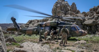 Turkish soldiers participate in an air operation in northern Iraq on an unknown date. (AA Photo)