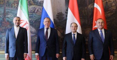 Russian FM Sergey Lavrov (2nd L), Iran's Hossein Amir-Abdollahian (L), Syria's Faisal Mekdad (2nd R) and Türkiye's Mevlüt Çavuşoğlu (R) pose after the meeting, in Moscow, Russia, May 10, 2023. (AFP Photo) 