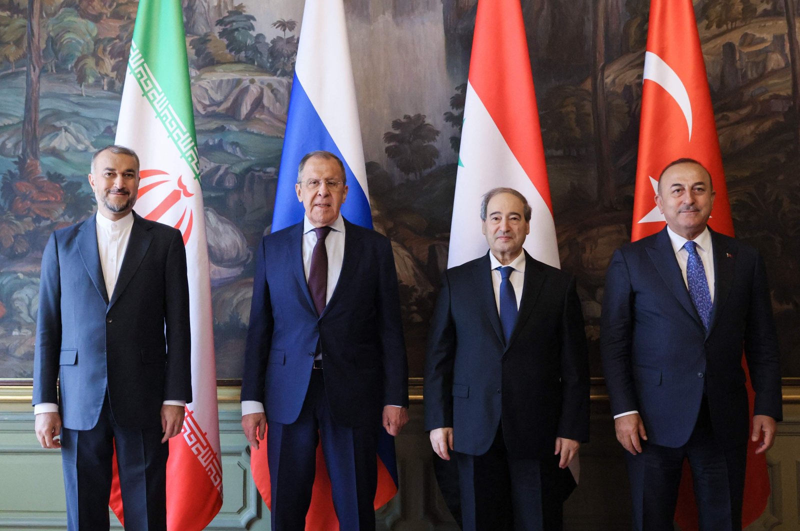Russian FM Sergey Lavrov (2nd L), Iran&#039;s Hossein Amir-Abdollahian (L), Syria&#039;s Faisal Mekdad (2nd R) and Türkiye&#039;s Mevlüt Çavuşoğlu (R) pose after the meeting, in Moscow, Russia, May 10, 2023. (AFP Photo) 