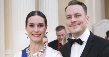 Prime Minister of Finland Sanna Marin (L) and her husband Markus Raikkonen participate attend a program in Helsinki, Finland, Dec. 6, 2022. (EPA Photo)