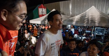 Pita Limjaroenrat (C), the Move Forward Party and candidate for prime minister in the upcoming general election during the pre-election campaign at Samut Prakarn, Thailand, May 5, 2023. (Getty Images Photo)