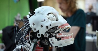 A robot being assembled at Hanson Robotics, a robotics and artificial intelligence company which creates human-like robots, in Hong Kong, May 10, 2023. (AFP Photo)