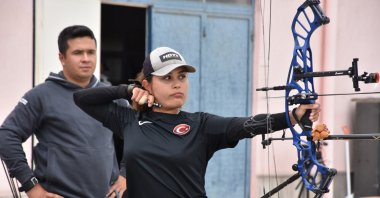 Turkish archery sensation Irmak Yüksel aims for target during her training at the Aksaray Paralympic Games Preparation Center, Aksaray, Türkiye, May 10, 2023. (AA Photo)